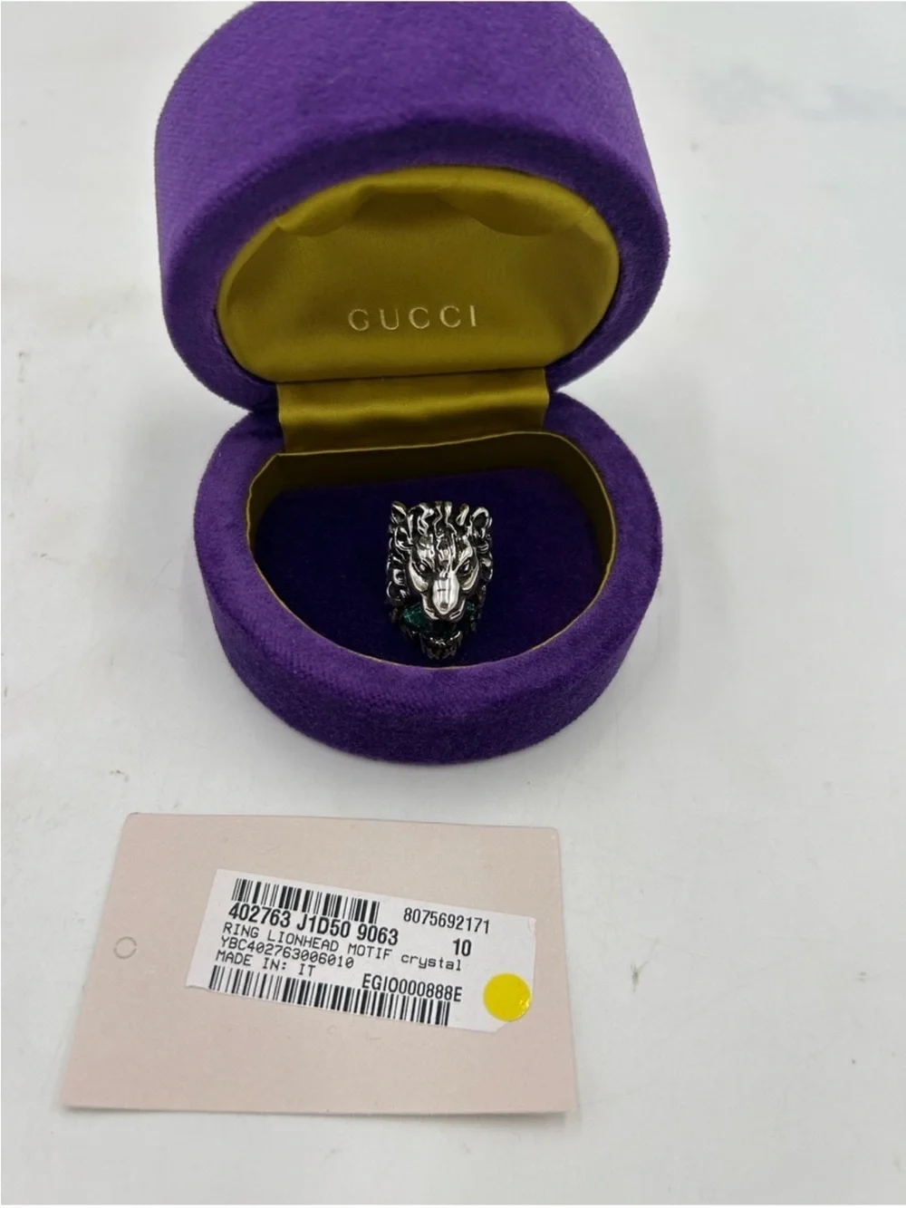 Unisex Gucci, silver Lionhead ring with green crystal in mouth size 4.5